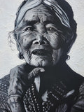 Old woman painting