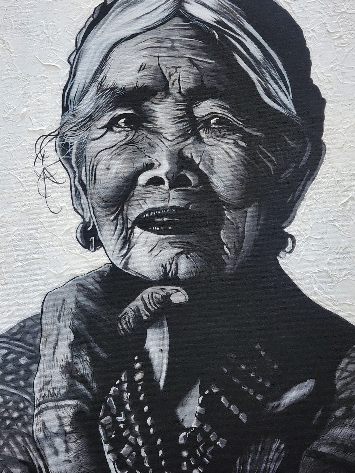 Old woman painting