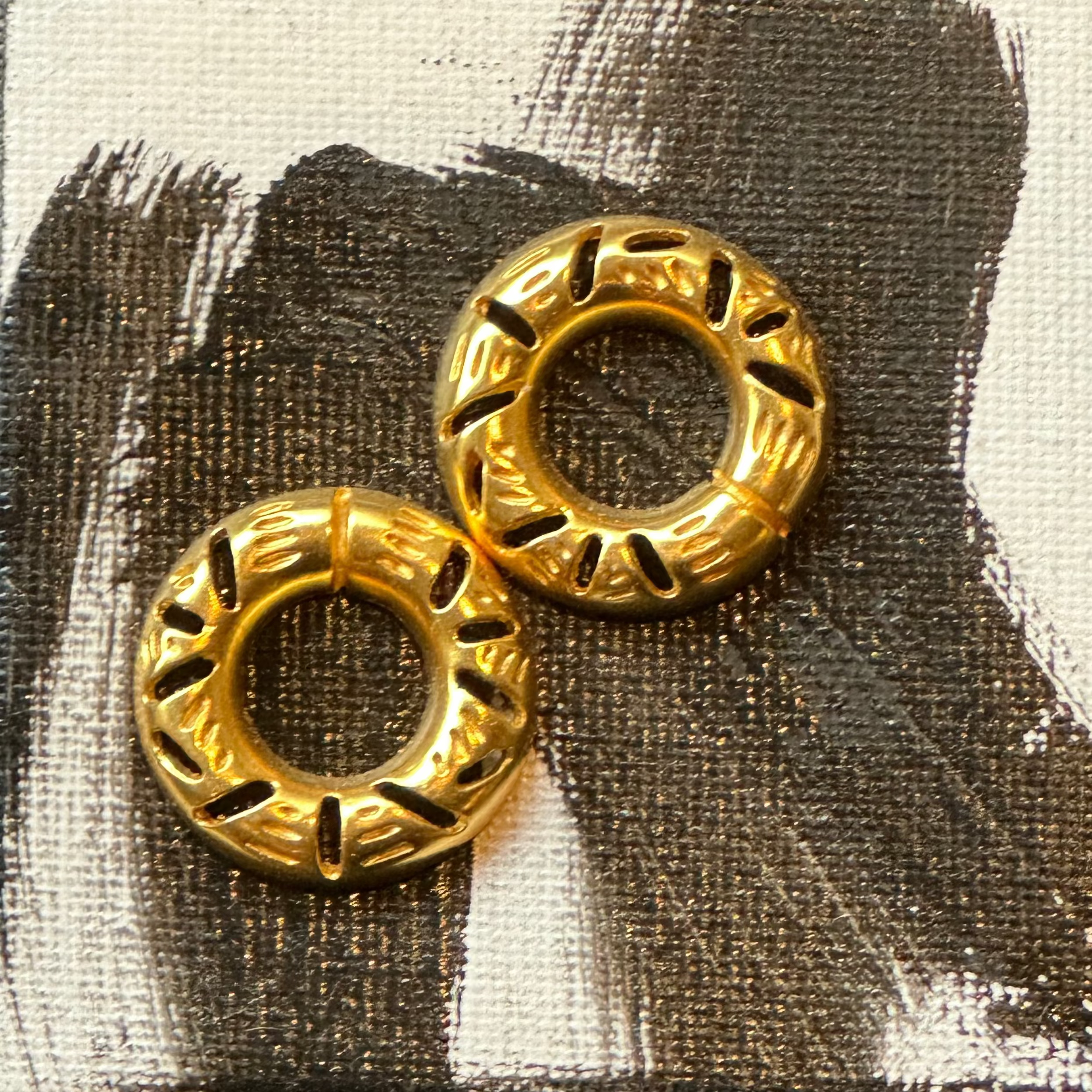 circular ring earrings with cutout detailing